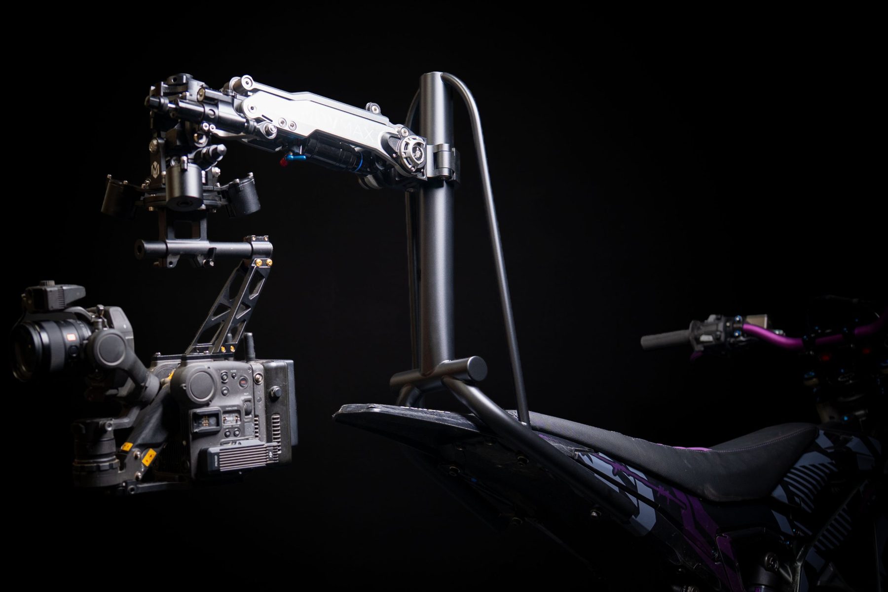 COB on a Surron Ultra Bee with a stabilized arm and cinema camera rigged to the speedrail